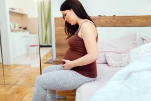 Боль в паху при беременности на поздних сроках