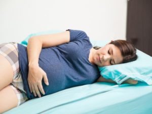 Во время беременности болят бока во время сна